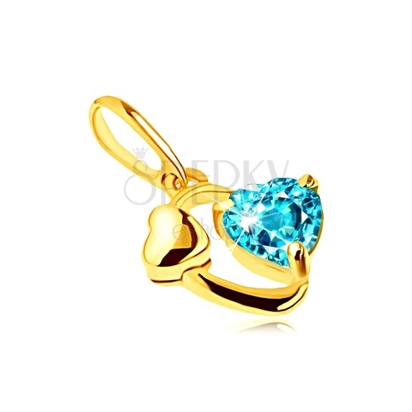Pandantiv din aur 375 - contur oval, inimă lucioasă, inimă din topaz albastru
