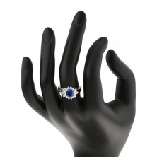 Inel cu braţe despicate, zirconiu oval albastru închis, margini transparente