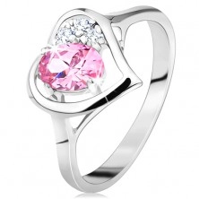 Inel de culoare argintie, contur în formă de inimă cu un zirconiu oval roz și cu zirconii transparente
