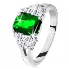 Inel strălucitor de culoare argintie, zirconiu verde-smarald, brațe despicate