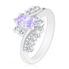 Inel de culoare argintie, zirconiu în formă de bob violet deschis, linii din zirconii transparente