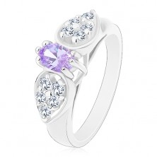 Inel de culoare argintie, fundiţă lucioasă cu zirconiu oval violet deschis