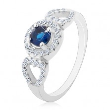 Inel realizat din argint 925, zirconiu albastru rotund, contur inimă lucioasă, contur pe laterale