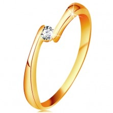 Inel din aur galben 14K - diamant transparent între capetele înguste ale brațelor