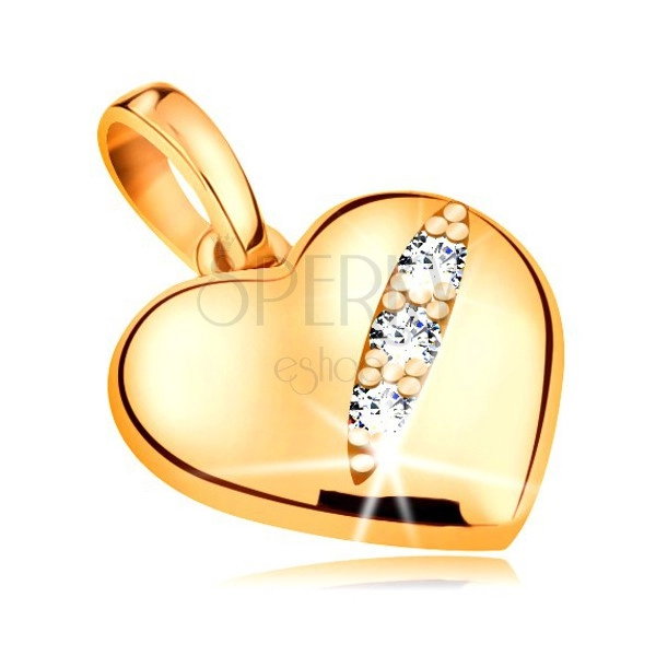   Pandantiv realizat din aur galben de 14K- inimă simetrică și proeminentă cu trei zirconii intr-o crestătură