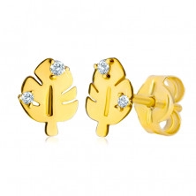 Cercei din aur de 14K - frunză de Monstera strălucitoare cu crestături și tulpină, două diamante strălucitoare, transparente